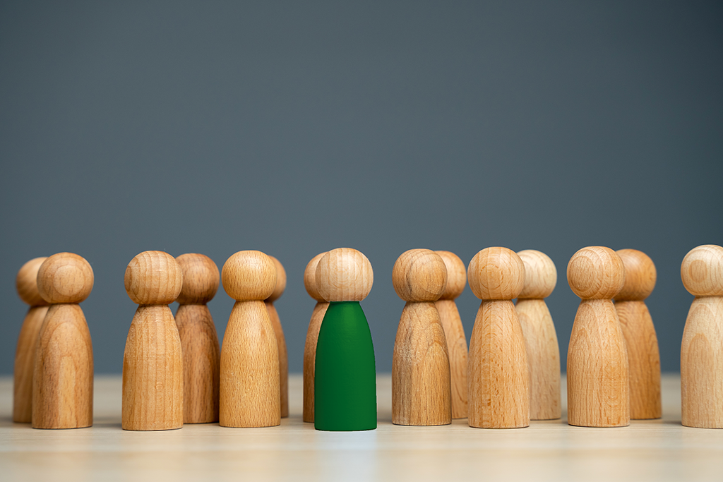 Image of a highlighted figure within a wider group
