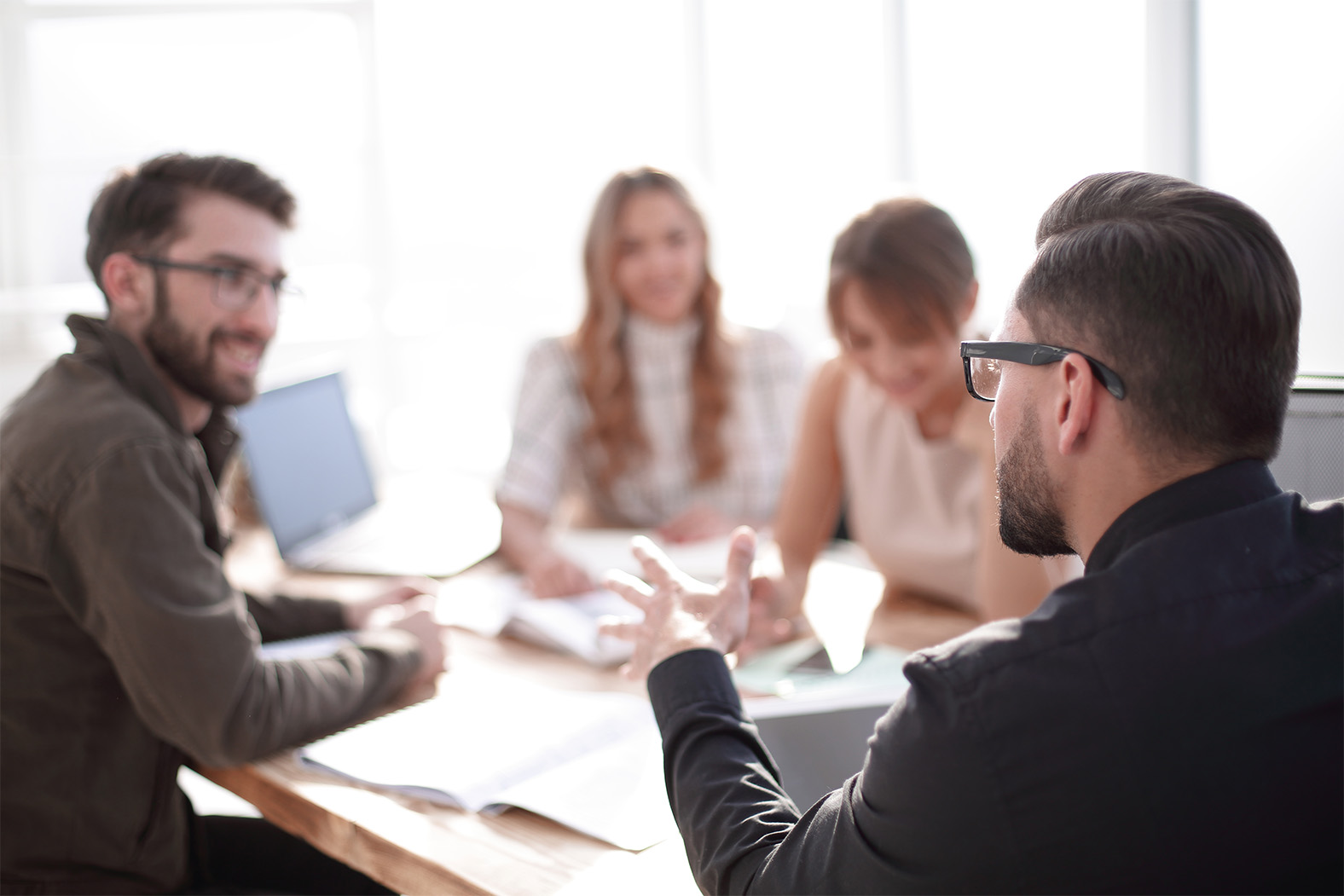 Image of colleagues collaborating in an office