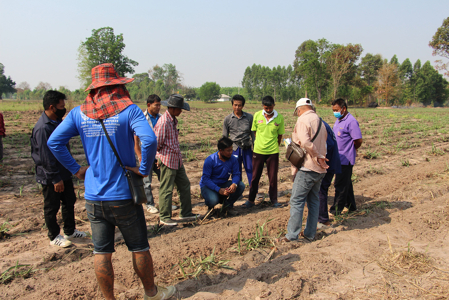 Image of farmers during an on-site training session