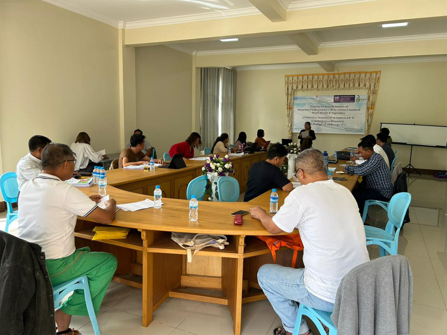 Particpants sit in a classroom during the GLOBALG.A.P. capacity building project in Myanmar.