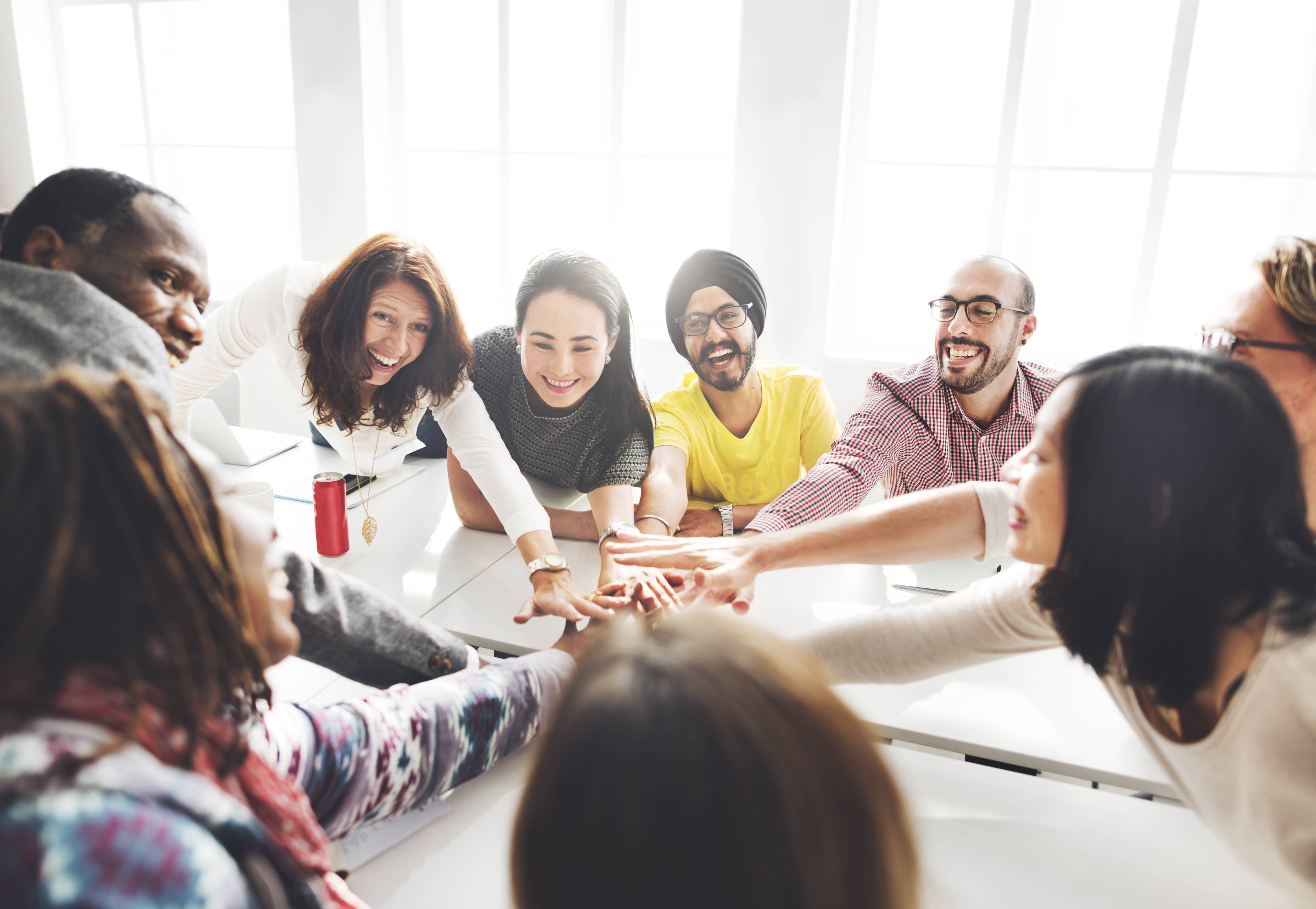 Image of team members discussing ideas and reaching a consensus