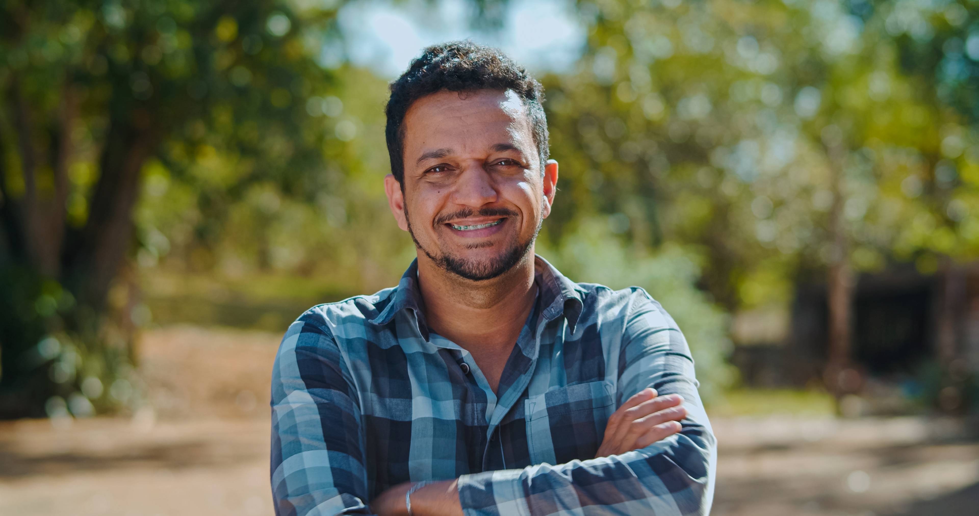 Image of a farm consultant during a field visit to a local producer