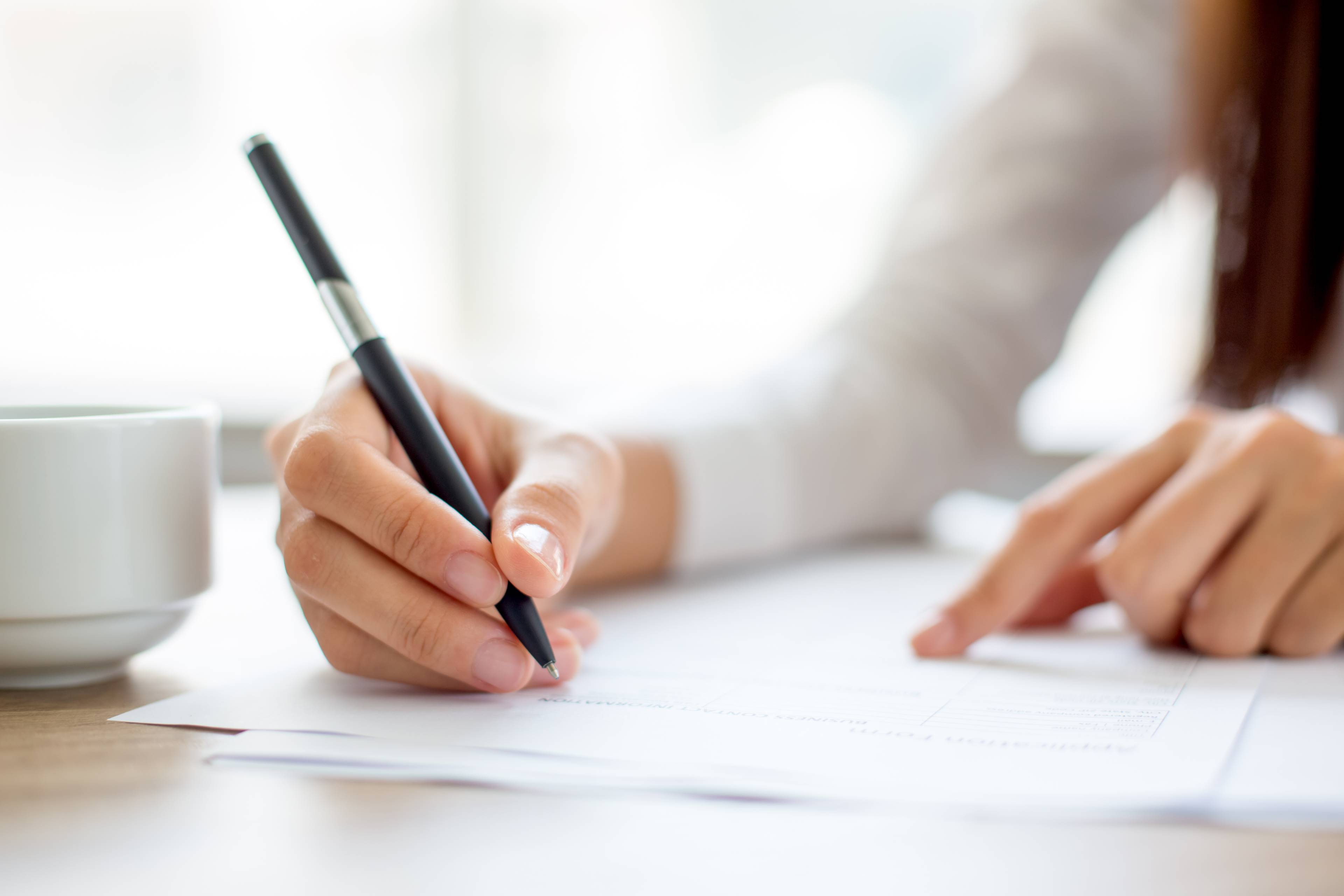 Image of a team member drafting and commenting on a document