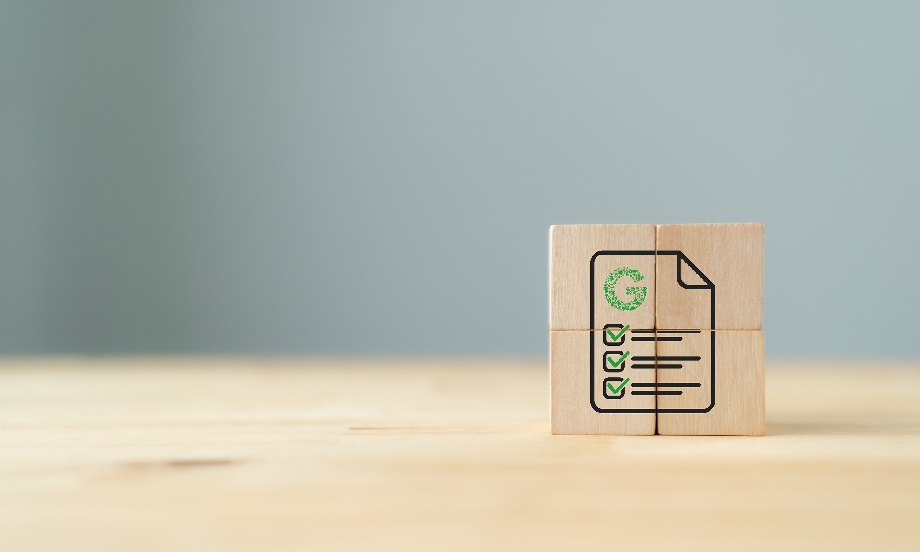 Image of wooden blocks assembled to create a certificate icon