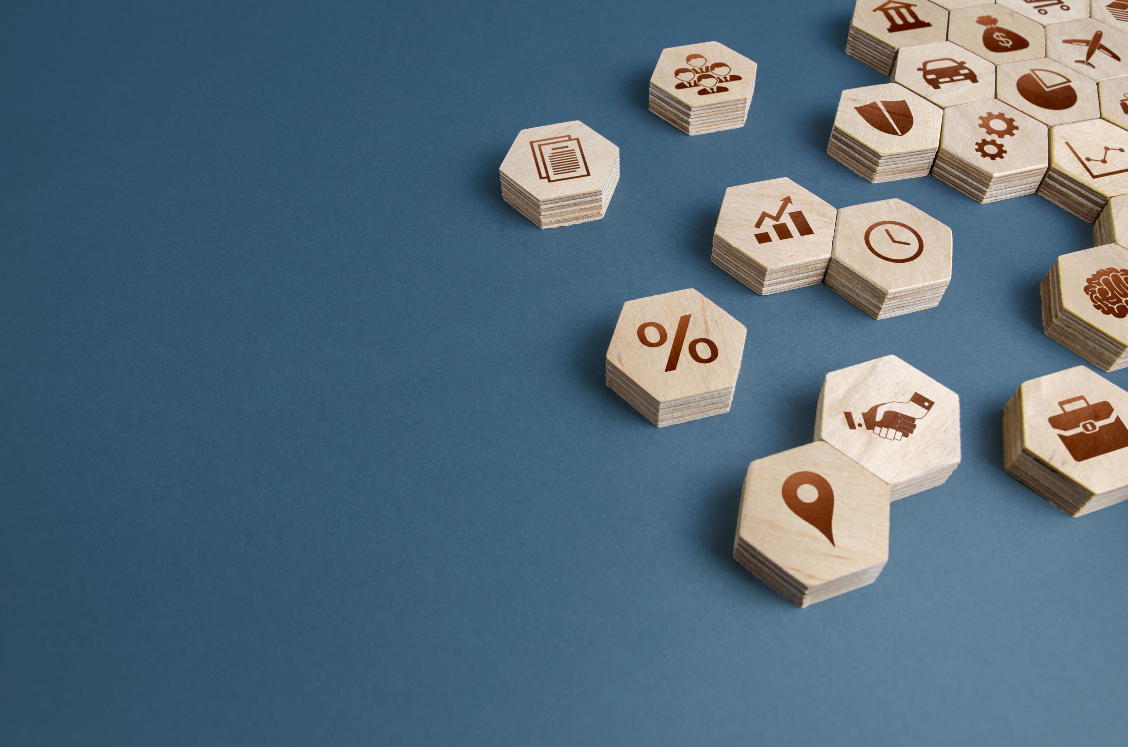 Image of wooden blocks with different icons assembled together