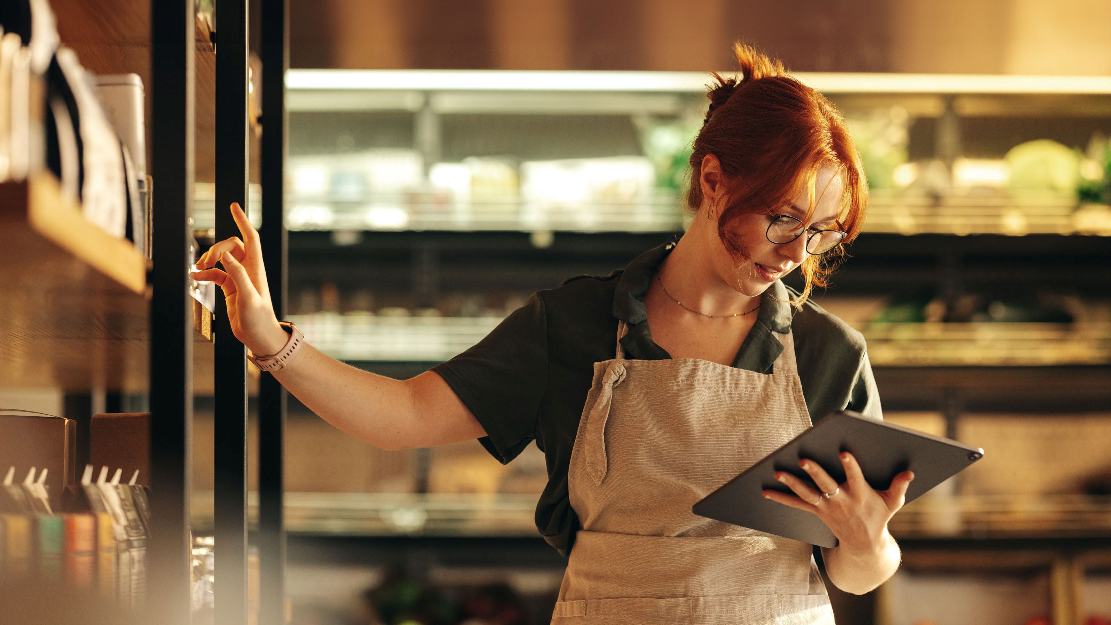 Image of two colleagues verifying the certification status of a supplier