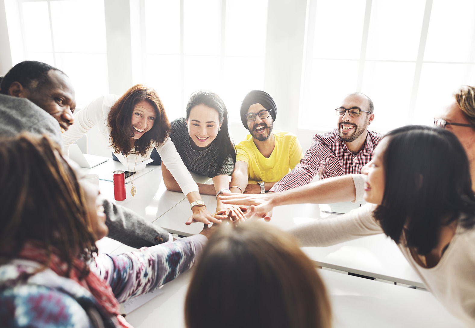 Image of team members discussing ideas at a meeting