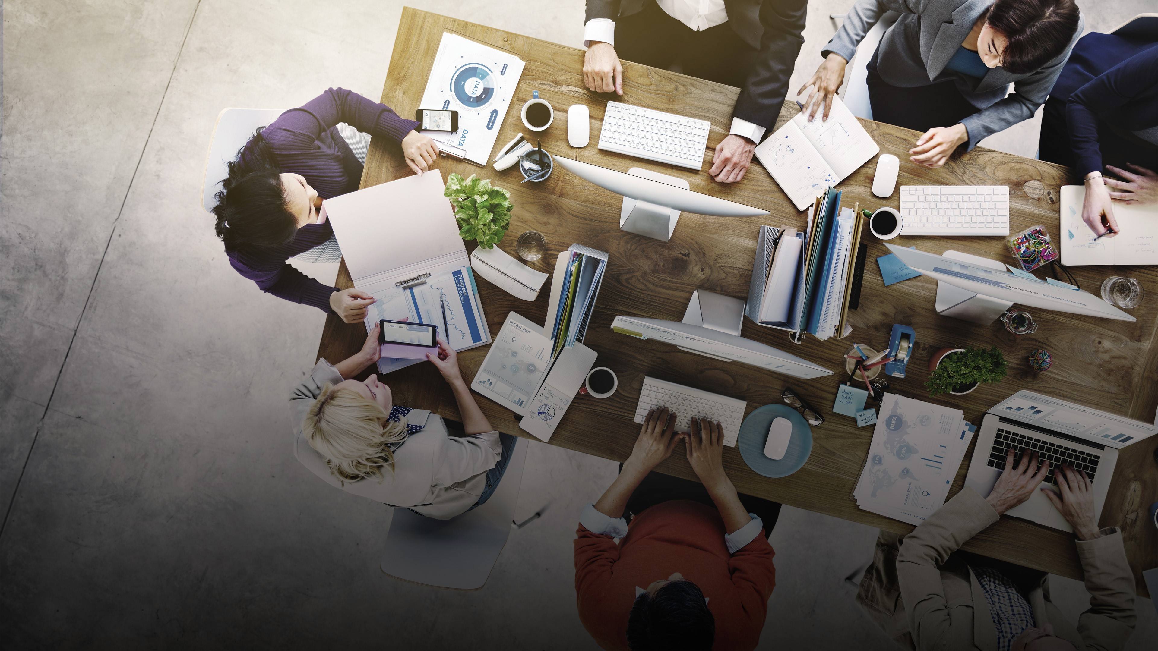 Image of participants discussing ideas during a meeting